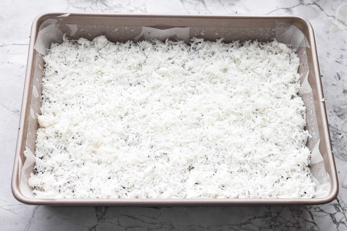 Sweetened coconut layered over the top of the chocolate chips. 