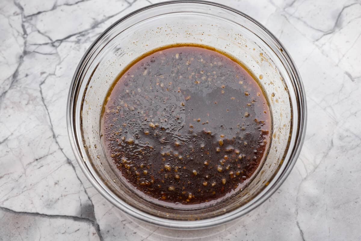 Skip the takeout and make this easy baked General Tso’s chicken at home! It’s crispy, saucy, and perfectly sweet with just the right amount of heat, no deep fryer required. Sauce ingredients combined in a mixing bowl.