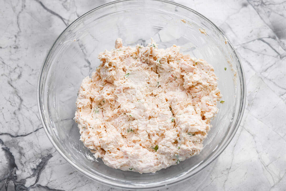 Overhead shot of the chicken mixture ingredients mixed together. 