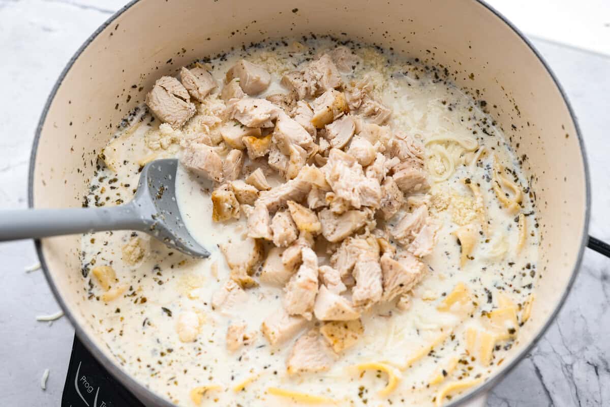 Pre-cooked chicken added to the soup. 