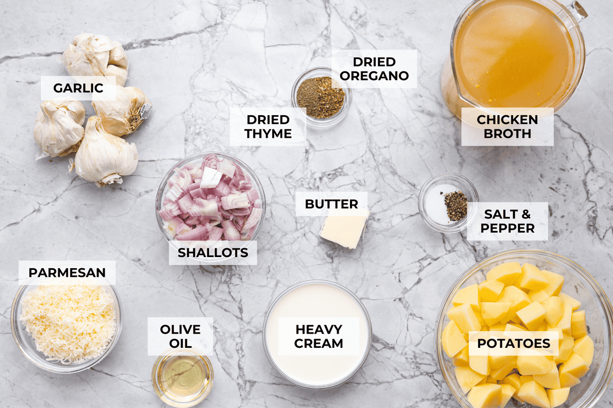 Overhead shot of labeled roasted garlic soup ingredients. 