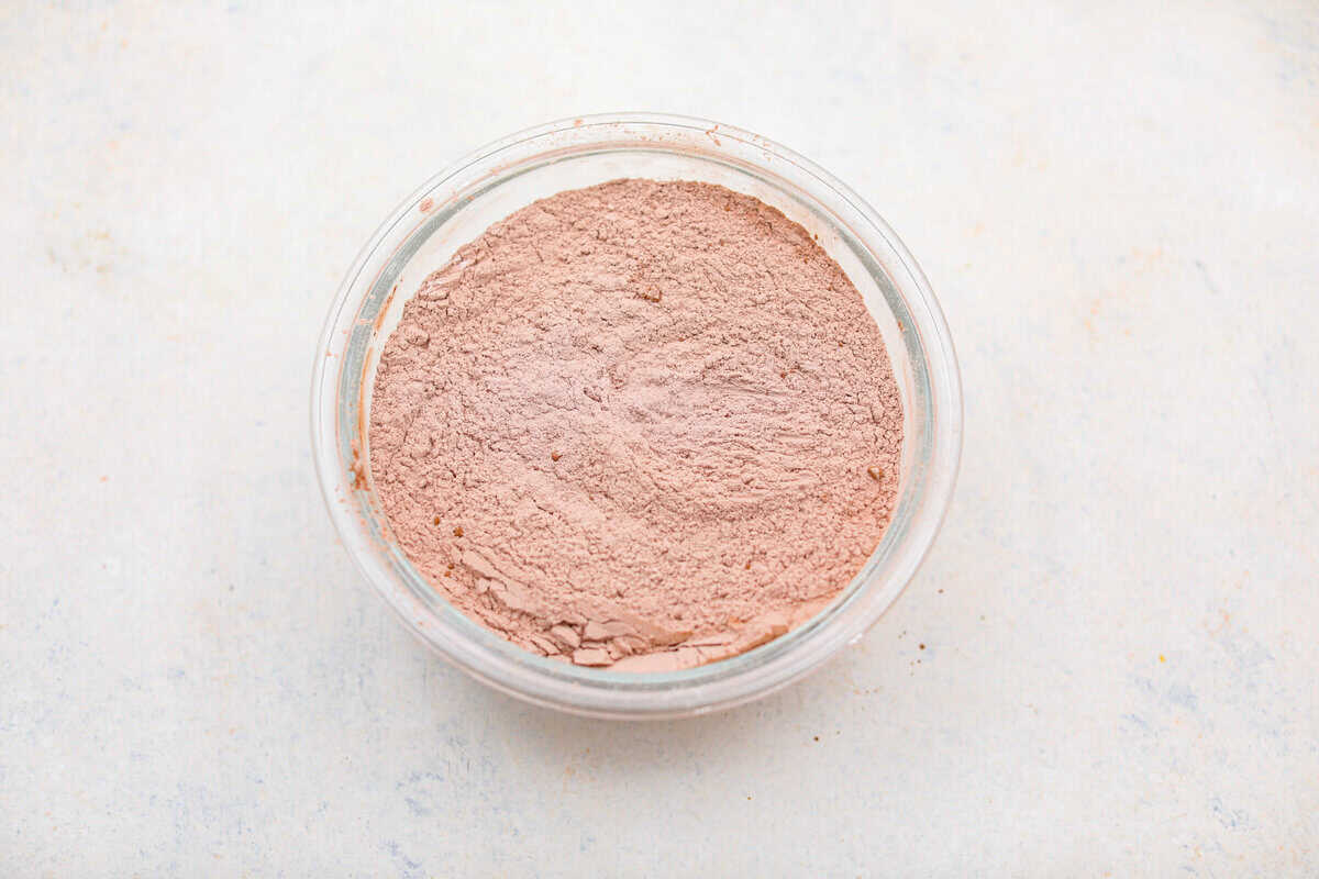 Dry ingredients mixed together in a mixing bowl.